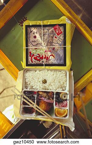 Stock Image - Close-up of a traditional Japanese lunch box, Japan. Fotosearch