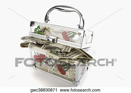Close-up of a transparent box filled with paper currency View Large Photo Image Stock Image - Close-up of a transparent box filled with paper currency. Fotosearch