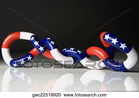Stock Image - Close-up of a twisted American toy flag. Fotosearch