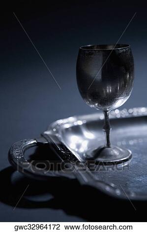 Close-up of a wine goblet on a tray View Large Photo Image Stock Image - Close-up of a wine goblet on a tray. Fotosearch