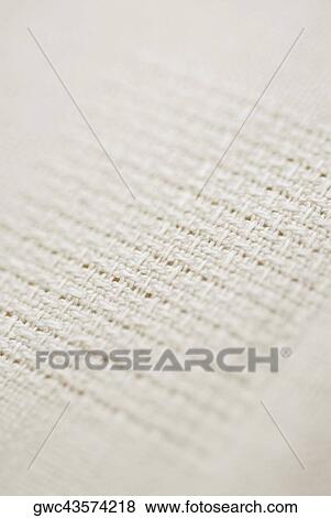 Close-up of a woven fabric View Large Photo Image Stock Photo - Close-up of a woven fabric. Fotosearch