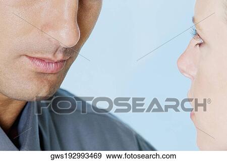Close-up of a young couple View Large Photo Image Stock Photo - Close-up of a young couple. Fotosearch