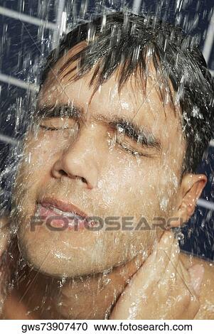 Close-up of a young man in the shower View Large Photo Image Stock Image - Close-up of a young man in the shower. Fotosearch