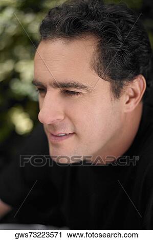 Close-up of a young man View Large Photo Image Stock Image - Close-up of a young man. Fotosearch