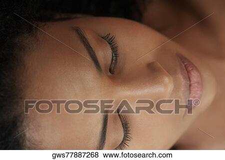 Close-up of a young woman View Large Photo Image Stock Photo - Close-up of a young woman. Fotosearch