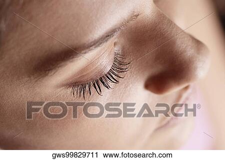 Close-up of a young woman's eye closed View Large Photo Image Stock Image - Close-up of a young woman's eye closed. Fotosearch