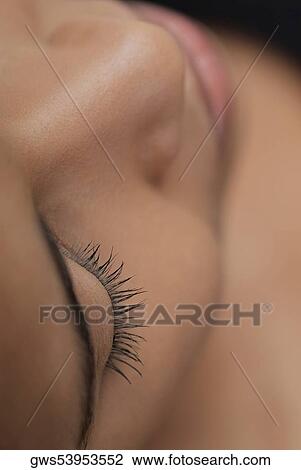 Close-up of a young woman's face View Large Photo Image Stock Image - Close-up of a young woman's face. Fotosearch
