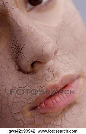 Close-up of a young woman's face with a facial mask View Large Photo Image Stock Image - Close-up of a young woman's face with a facial mask. Fotosearch