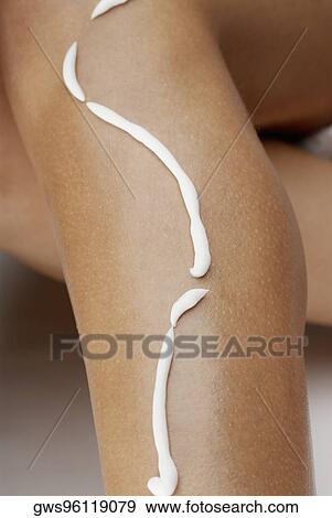 Close-up of a young woman's leg with hair removing cream View Large Photo Image Stock Photo - Close-up of a young woman's leg with hair removing cream. Fotosearch