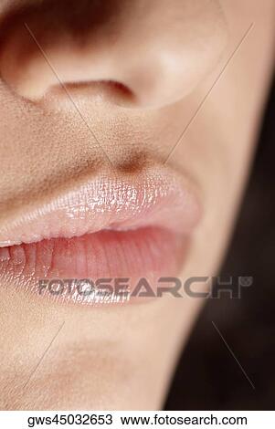 Close-up of a young woman's lips View Large Photo Image Stock Image - Close-up of a young woman's lips. Fotosearch