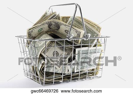 Close-up of American paper currency in a shopping basket View Large Photo Image Stock Photograph - Close-up of American paper currency in a shopping basket. Fotosearch