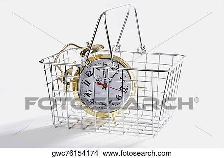 Close-up of an alarm clock in a basket View Large Photo Image Picture - Close-up of an alarm clock in a basket. Fotosearch