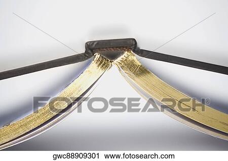 Stock Image - Close-up of an open book. Fotosearch