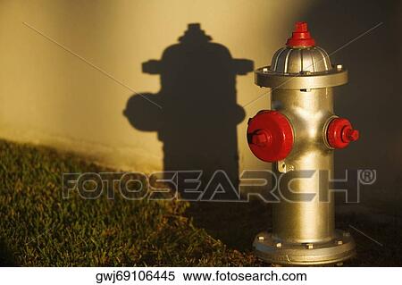 Stock Photography - Close-up of an open fire hydrant. Fotosearch