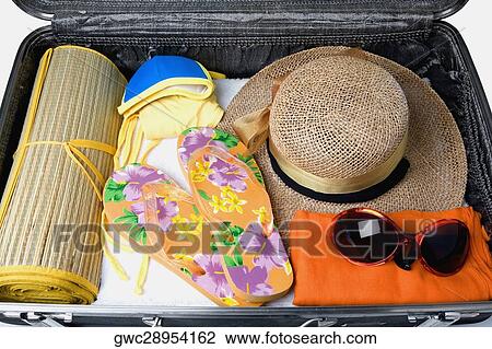 Close-up of an open suitcase View Large Photo Image Stock Image - Close-up of an open suitcase. Fotosearch
