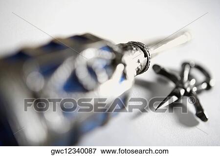 Close-up of an ornate bottle and pendant View Large Photo Image Stock Photo - Close-up of an ornate bottle and pendant. Fotosearch