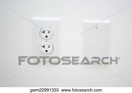 Close-up of an outlet on a wall View Large Photo Image Stock Image - Close-up of an outlet on a wall. Fotosearch