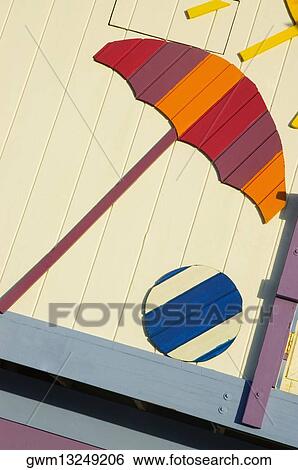 Close-up of an umbrella and a ball on a wooden structure View Large Photo Image Stock Photograph - Close-up of an umbrella and a ball on a wooden structure. Fotosearch