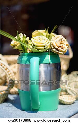 Close-up of artificial flowers in a vase View Large Photo Image Stock Photo - Close-up of artificial flowers in a vase. Fotosearch