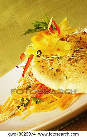 Close-up of bread and slices of cheese on a plate View Large Photo Image Picture - Close-up of bread and slices of cheese on a plate. Fotosearch