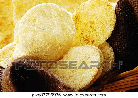 Close-up of bread in a basket View Large Photo Image Stock Photograph - Close-up of bread in a basket. Fotosearch