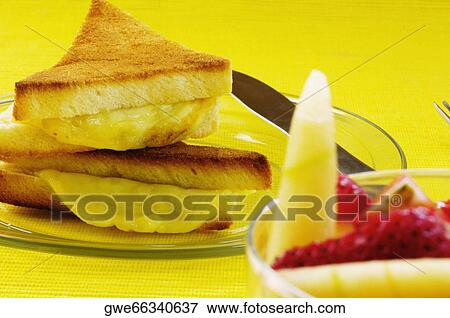 Close-up of bread with a bowl of fruit salad View Large Photo Image Stock Photo - Close-up of bread with a bowl of fruit salad. Fotosearch