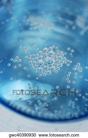 Close-up of bubbles in soda View Large Photo Image Stock Image - Close-up of bubbles in soda. Fotosearch