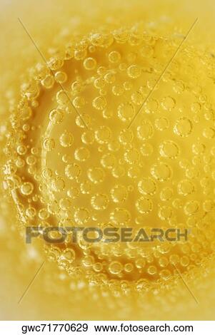 Close-up of bubbles in soda View Large Photo Image Stock Photo - Close-up of bubbles in soda. Fotosearch