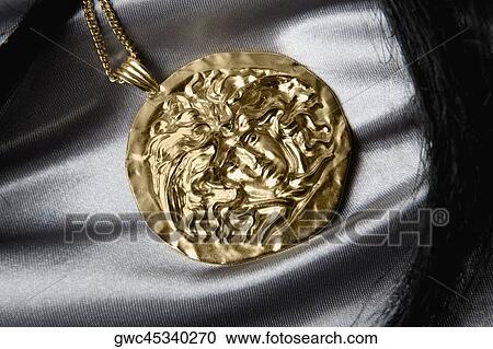 Close-up of carving on a pendant View Large Photo Image Stock Image - Close-up of carving on a pendant. Fotosearch