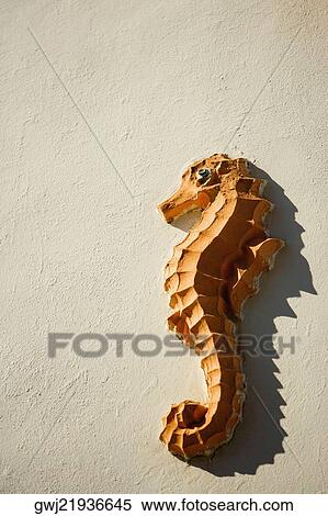 Close-up of carving on the wall View Large Photo Image Stock Photography - Close-up of carving on the wall. Fotosearch
