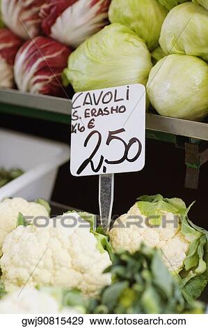 Close-up of cauliflowers and cabbages in a vegetable store View Large Photo Image Stock Photo - Close-up of cauliflowers and cabbages in a vegetable store. Fotosearch
