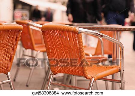 Close-up of chairs and tables in a restaurant View Large Photo Image Picture - Close-up of chairs and tables in a restaurant. Fotosearch