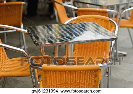 Close-up of chairs and tables in a restaurant View Large Photo Image Picture - Close-up of chairs and tables in a restaurant. Fotosearch