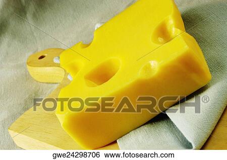 Close-up of cheese and a napkin on a cutting board View Large Photo Image Stock Photograph - Close-up of cheese and a napkin on a cutting board. Fotosearch