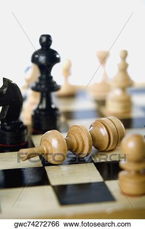 Close-up of chess pieces View Large Photo Image Stock Photograph - Close-up of chess pieces. Fotosearch