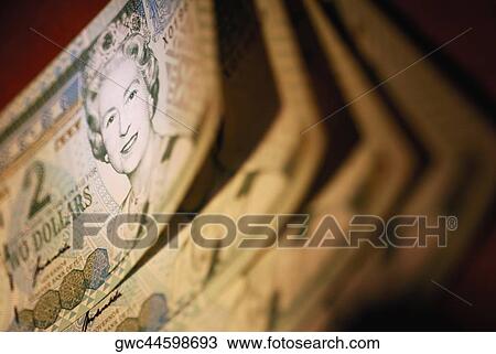 Stock Image - Close-up of dollar bills. Fotosearch