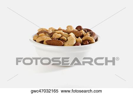 Stock Photography - Close-up of dry fruits in a bowl. Fotosearch
