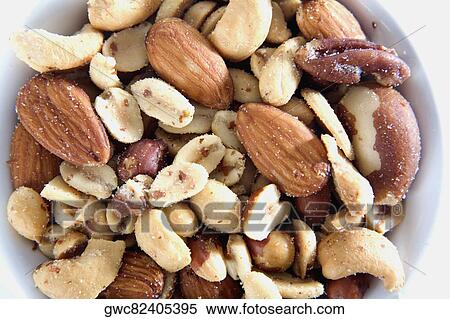 Close-up of dry fruits in a bowl View Large Photo Image Stock Photography - Close-up of dry fruits in a bowl. Fotosearch