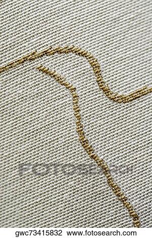 Close-up of embroidery on fabric View Large Photo Image Stock Image - Close-up of embroidery on fabric. Fotosearch