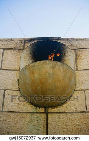 Close-up of fire on the wall at a memorial View Large Photo Image Stock Photo - Close-up of fire on the wall at a memorial. Fotosearch