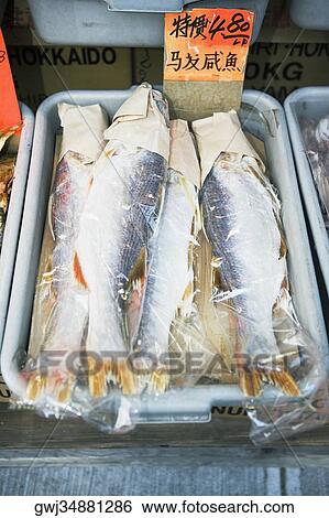 Close-up of fish in a fish market View Large Photo Image Stock Photograph - Close-up of fish in a fish market. Fotosearch