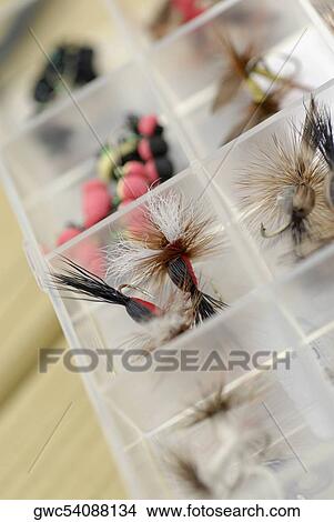 Picture - Close-up of fishing lures in a box. Fotosearch