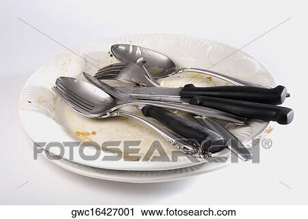 Close-up of forks and spoons with knives on a plate View Large Photo Image Stock Image - Close-up of forks and spoons with knives on a plate. Fotosearch