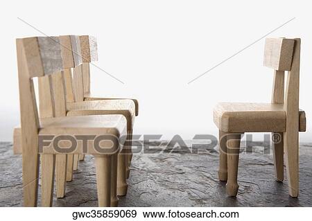 Close-up of four wooden chairs View Large Photo Image Stock Photo - Close-up of four wooden chairs. Fotosearch