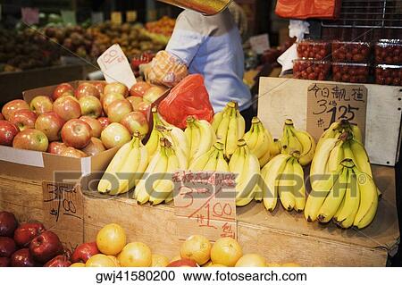 Close-up of fruit at a market stall View Large Photo Image Stock Image - Close-up of fruit at a market stall. Fotosearch