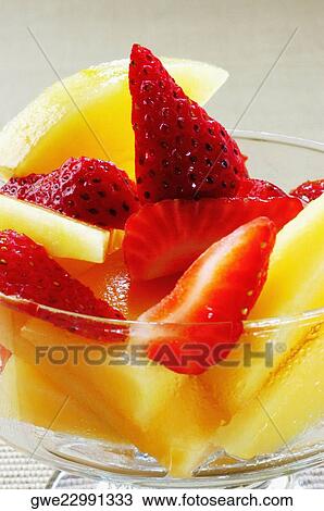 Close-up of fruit salad in a bowl View Large Photo Image Stock Image - Close-up of fruit salad in a bowl. Fotosearch