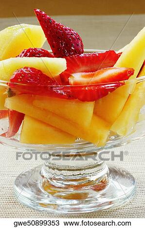 Close-up of fruit salad in a bowl View Large Photo Image Stock Image - Close-up of fruit salad in a bowl. Fotosearch