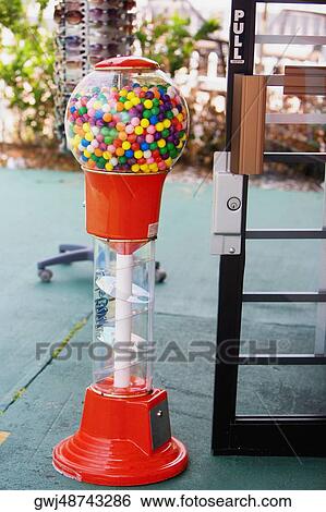 Stock Photograph - Close-up of gumball machine. Fotosearch