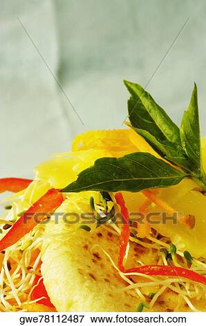 Close-up of herbs and cheese on bread View Large Photo Image Stock Photo - Close-up of herbs and cheese on bread. Fotosearch