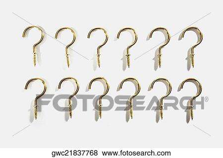 Close-up of hooks in a row View Large Photo Image Stock Photo - Close-up of hooks in a row. Fotosearch